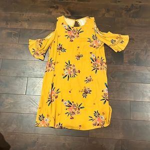 Dark yellow dress with colorful flowers